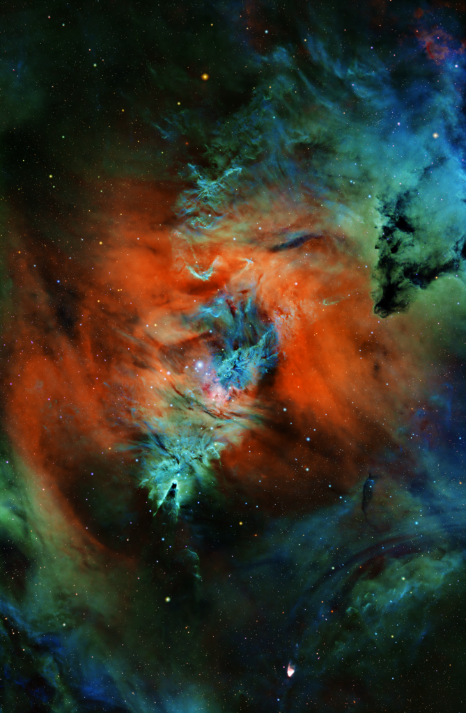 Astrophotography image of the Cone Nebula and Christmas Tree cluster with Hubble's Variable Nebula